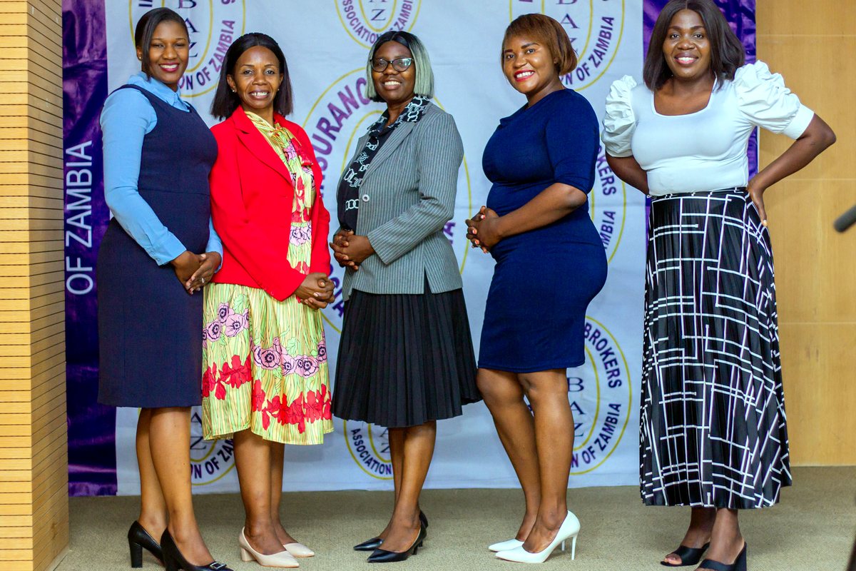 IBAZ delegates photographed at the association backdrop