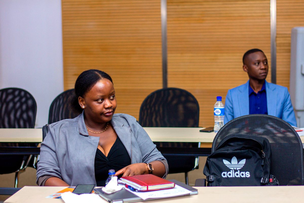A delegate reviewing insurance materials at an IBAZ session