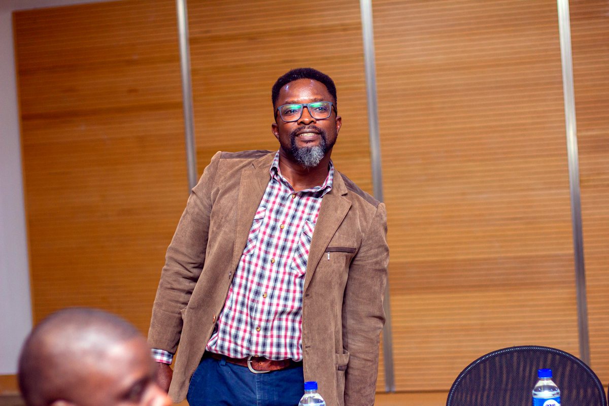 An insurance broker speaking to colleagues at an IBAZ session